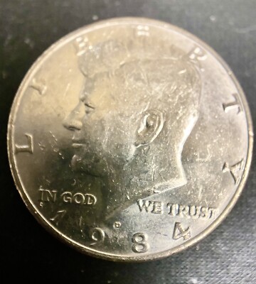 1984-D Kennedy half dollar RPM-001 repunched mint mark macro close-up showing D/D North doubling on the D mint mark